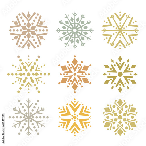 Set of abstract geometric snowflakes in gold shades. vector illustration