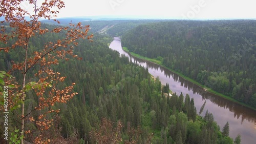 Landscape view to north river Usva from Ural mountain near Usvinskiye poles, Perm region, Russia on natural forest background photo