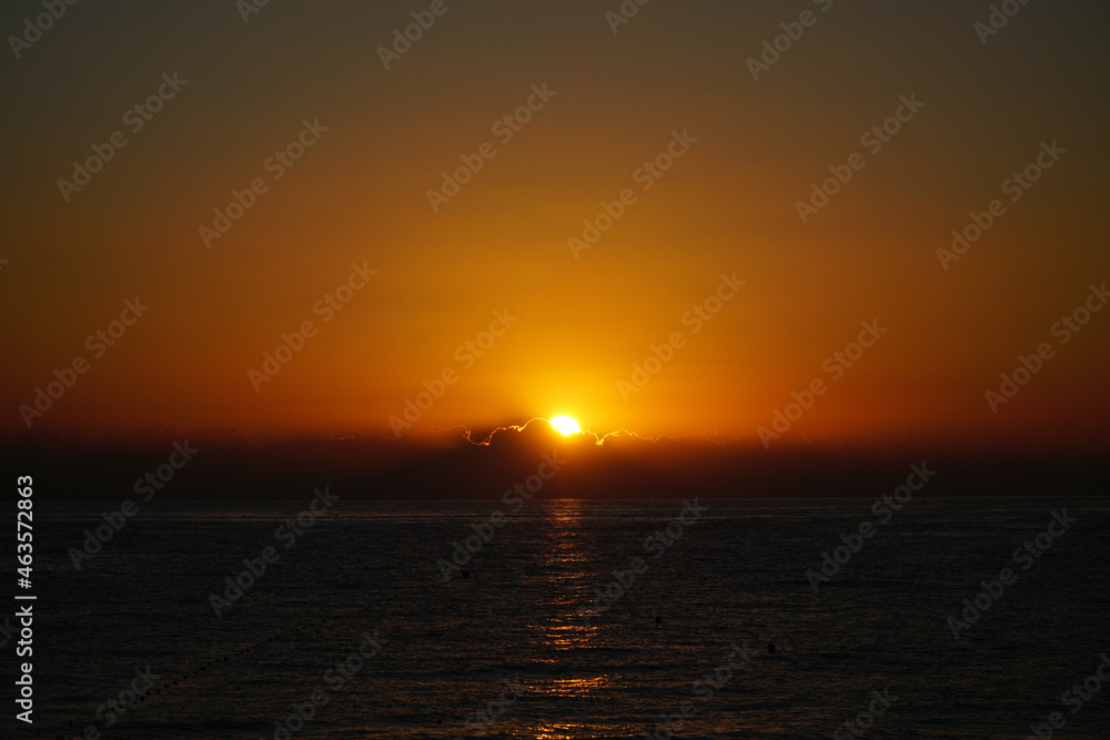 Sun Rising On The Sea