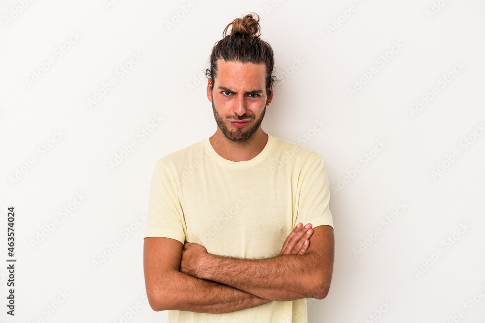 Young caucasian man isolated on white background unhappy looking in camera with sarcastic expression. Young caucasian man isolated on white background unhappy looking in camera with sarcastic expression.