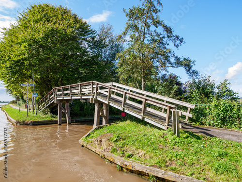 Wooden bridge for cycles and pedestrians by Dokkumer Ee in Bartlehiem  Friesland  Netherlands