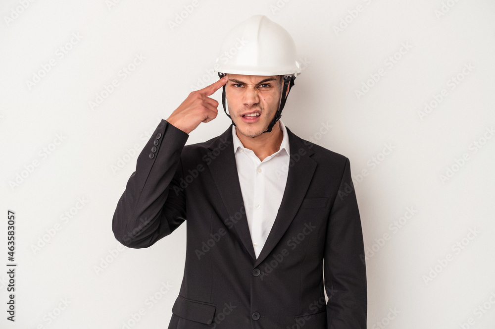 Young architect caucasian man isolated on white background showing a disappointment gesture with forefinger. Young architect caucasian man isolated on white background showing a disappointment gesture with forefinger.