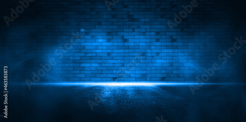 Neon blue light on neon brick wall. 