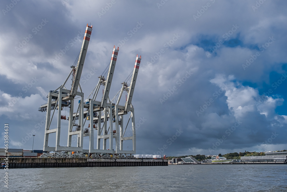 Container cranes in Hamburg harbor, Germany Container cranes in Hamburg harbor, Germany