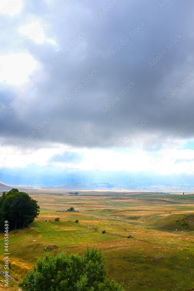 Curvy hills and cloudy sky.  Montenegro
