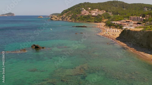 Aerial view of beautiful island of Ibiza coast with boats, and increadible landscapes. Spain. photo