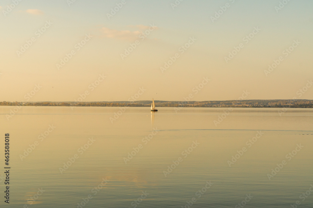 Beautiful water landscape with boat at sunset Beautiful water landscape with boat at sunset