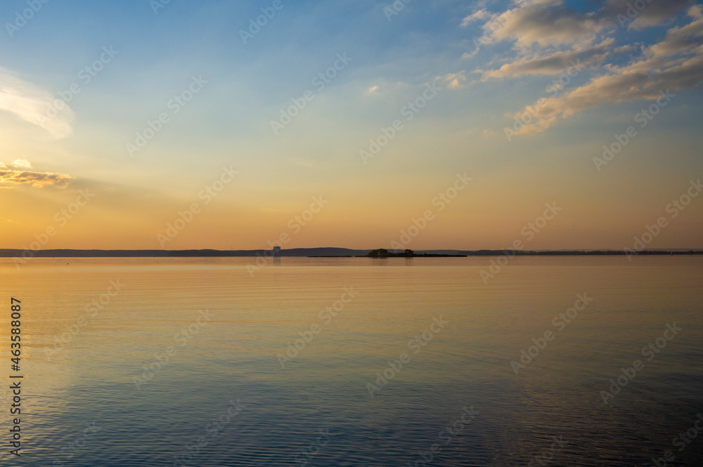 Calm gentle sunset on the sea without wind Calm gentle sunset on the sea without wind