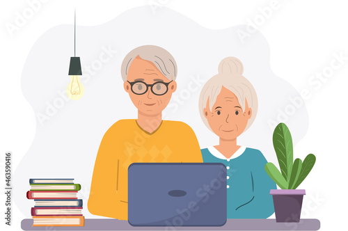 Cheerful couple of senior people using internet with laptop, senior people web surfing on internet, family concept