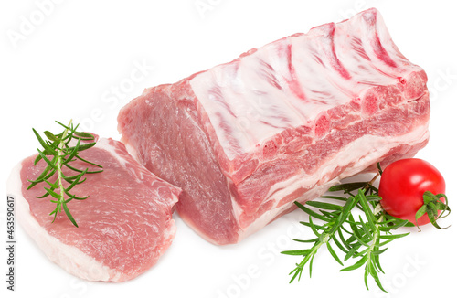 Quadro em tela sliced raw pork meat with rosemar, tomato and peppercorn isolated on white background