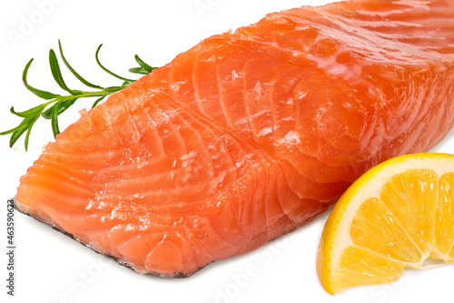 Red fish. Raw salmon fillet with rosemary, peppercorns and lemon isolate on white background. Clipping path and full depth of field