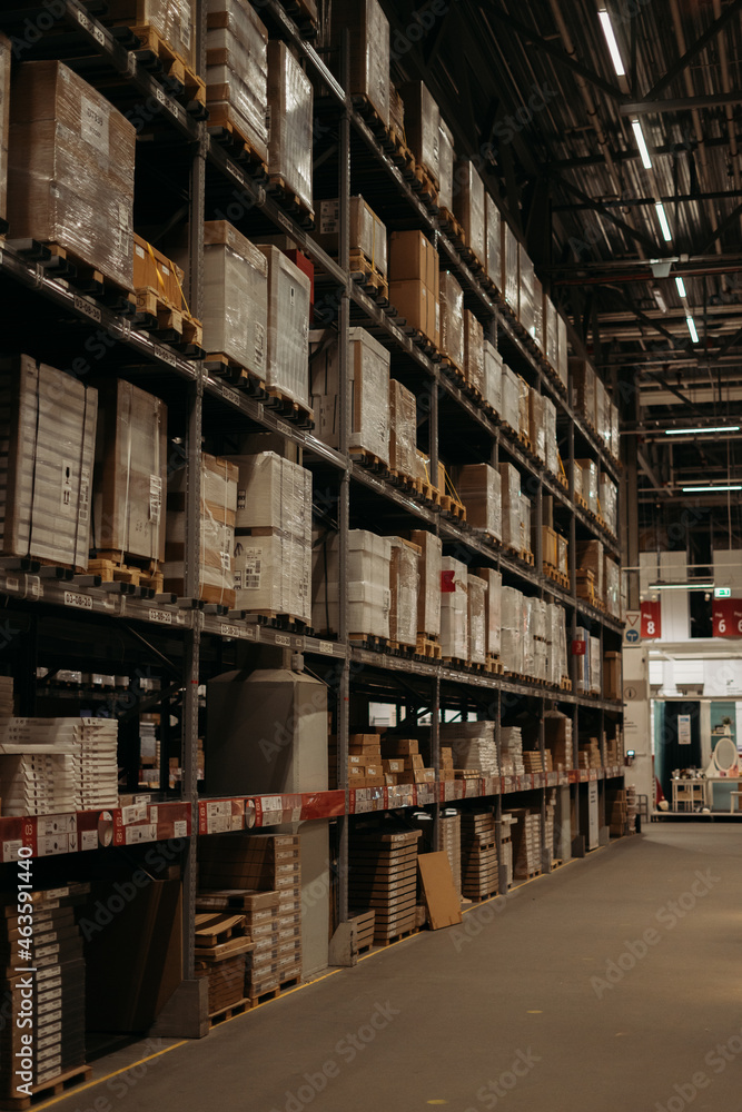 Fototapeta premium warehouse of goods in the store, racks with boxes