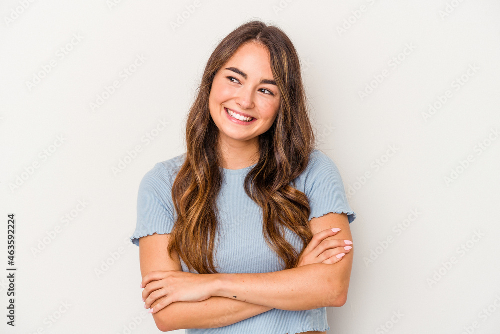 Young caucasian woman isolated on white background smiling confident with crossed arms. Young caucasian woman isolated on white background smiling confident with crossed arms.
