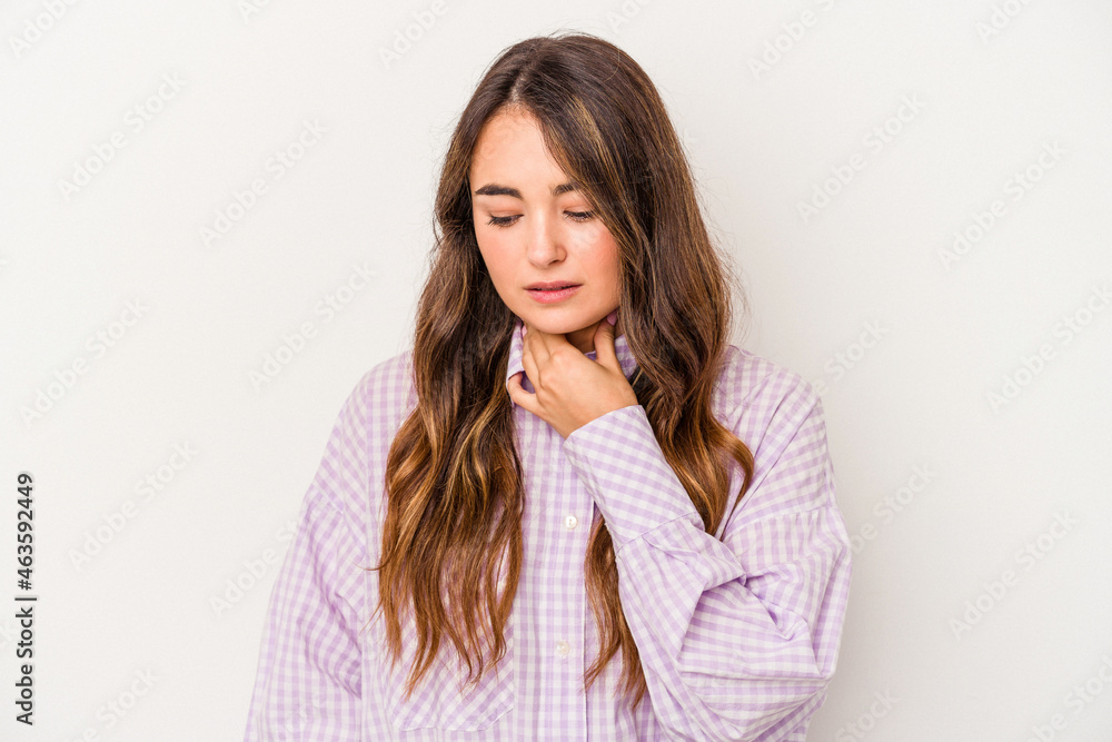 Young caucasian woman isolated on white background suffers pain in throat due a virus or infection. Young caucasian woman isolated on white background suffers pain in throat due a virus or infection.