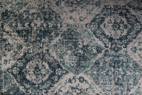 the texture of the carpet with a pattern of blue gray