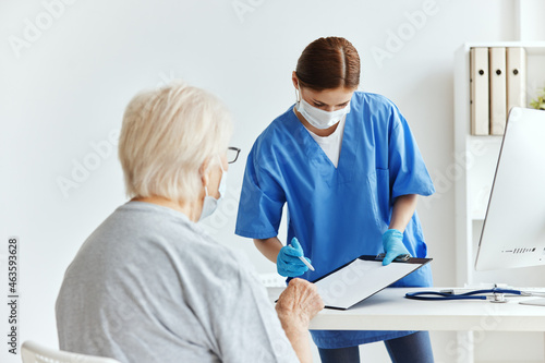 nurse and patient patient examination medical masks