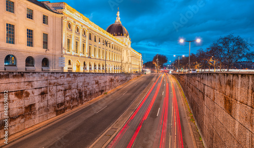 Long exposure photo of traffic on the move with Car lights trail at dusk on the road - Lyon, France