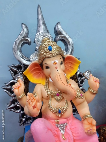 Lord Ganesha, is one of the best-known and most worshiped god in the Hindu religion lord Ganesha of Indian festival tradition.Gorgeous large statue of Lord Ganesha. photo