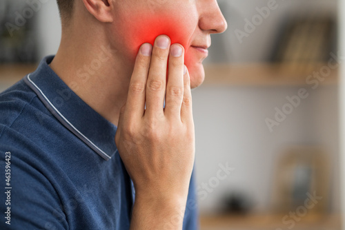 A man with toothache, periodontal disease in wisdom teeth Fototapeta
