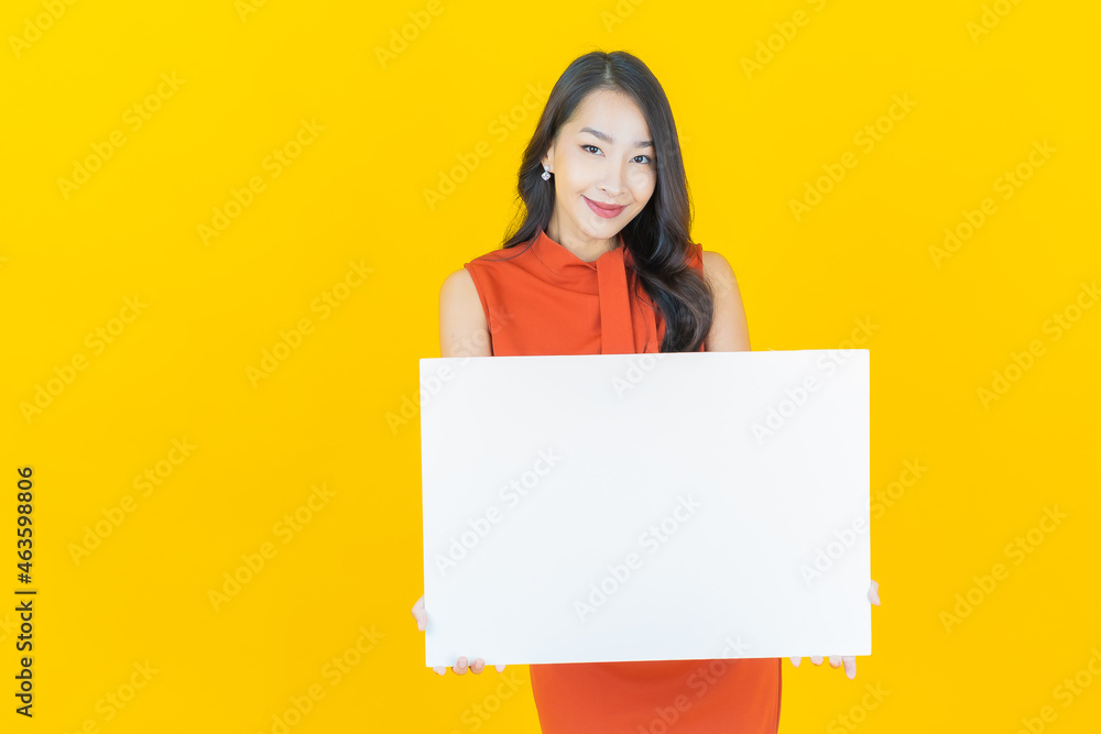 Portrait beautiful young asian woman with empty white billboard Portrait beautiful young asian woman with empty white billboard