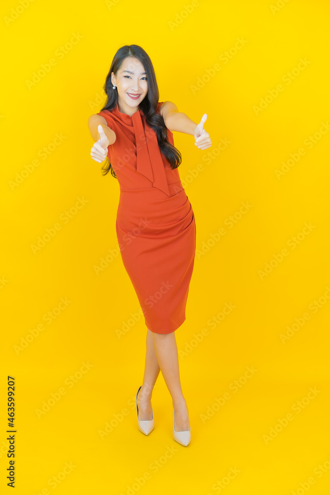 Portrait beautiful young asian woman smile with action Portrait beautiful young asian woman smile with action