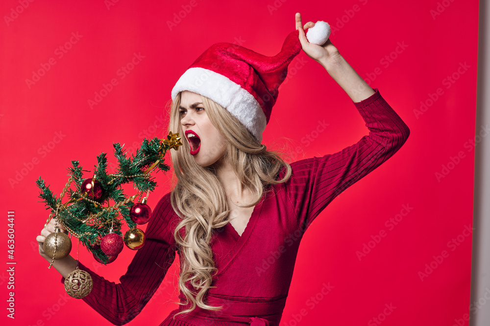 woman in red dress christmas tree toys holiday pink background woman in red dress christmas tree toys holiday pink background