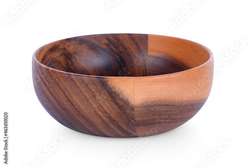 empty wood bowl on white background. © sangsiripech