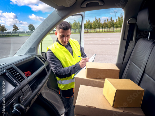 courier service. Man is eng...