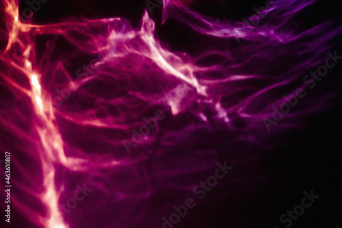 Abstract red and purple light neon on black background. Dark night glow futuristic motion wallpaper with noise texture