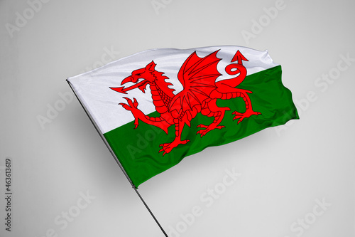 Wales flag isolated on white background. close up waving flag of Wales. flag symbols of Wales. Concept of Wales.