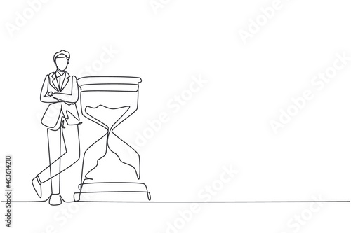 Single continuous line drawing businessman lean on huge giant hourglass for time is money financial investment concept. Time management conceptual metaphor. One line draw design vector illustration