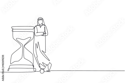 Continuous one line drawing Arab businessman lean on huge giant hourglass. Time is money financial investment concept. Time management conceptual metaphor. Single line draw design vector illustration