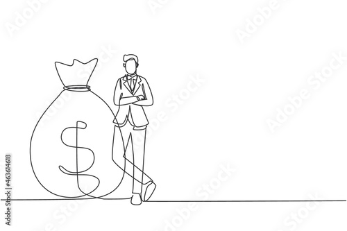 Continuous one line drawing happy businessman in suit standing near big heavy bag with dollar sign. Male leaning on money sack. Success concept. Single line draw design vector graphic illustration