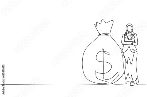 Single continuous line drawing Arabian businesswoman in hijab standing near big heavy bag with dollar sign. Female leaning on money sack. Successful concept. One line draw design vector illustration