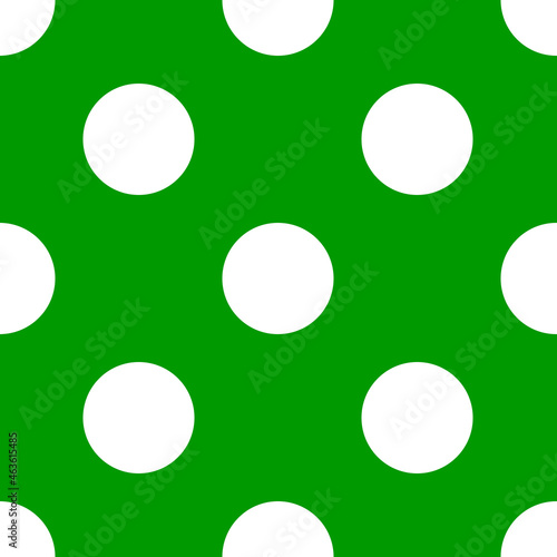 Seamless pattern of white polka dots with green background.