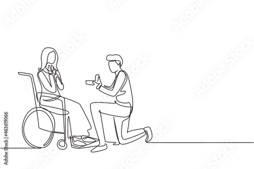 Continuous one line drawing young man stand on knee with engagement ring in hands in front of disabled woman sitting on wheelchair, loving relations, person marriage. Single line draw design vector