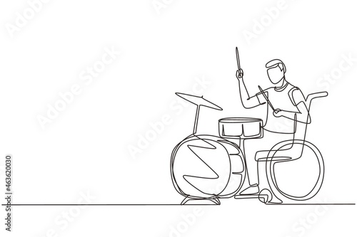 Single one line drawing disabled handsome man in wheelchair playing drum. Physically disabled. Person in hospital. Rehabilitation center patient. Continuous line draw design vector illustration