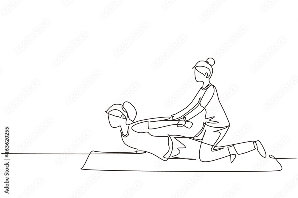 Single one line drawing professional therapist practicing massage therapy. Woman patient enjoying wellness spa body treatment. Rehabilitation, physiotherapy. Continuous line draw design graphic vector
