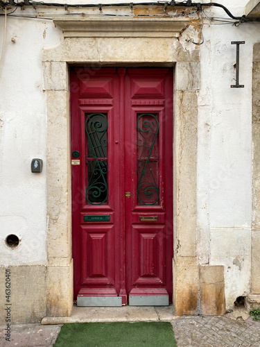 Old red door of Portuguese algarve village