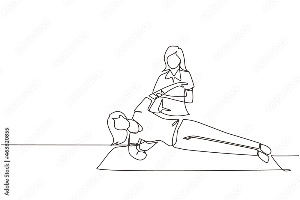 Single continuous line drawing woman patient lying on the floor masseur therapist doing healing treatment massaging patient body manual sport physical therapy. One line draw design vector illustration