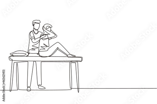 Single one line drawing man sitting on massage table masseur doing healing treatment massaging injured patient manual physical therapy rehabilitation. Continuous line draw design vector illustration