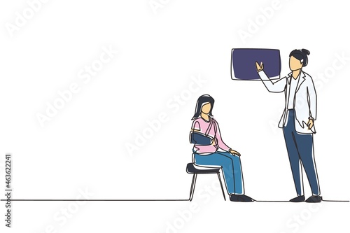 Single one line drawing medical doctor showing x-ray picture with limb fracture to female patient with broken arm. Woman with injured bandaged hand visit hospital. Continuous line draw design vector