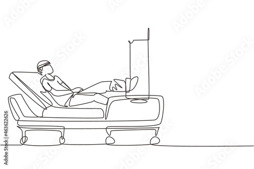 Single one line drawing male patient with broken leg lying in hospital. Hospitalization of patient. Sick person is in bed. The leg is bandaged and fixed with cast. Continuous line draw design vector