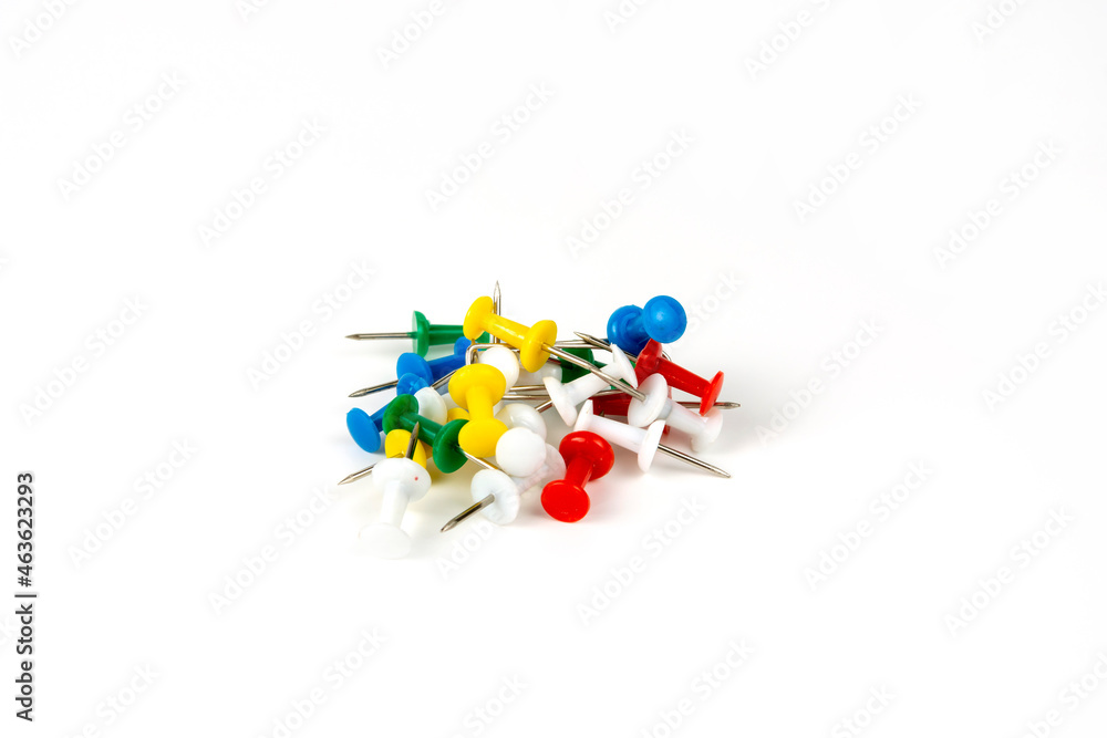 different color pushpins close-up. isolated on white background different color pushpins close-up. isolated on white background