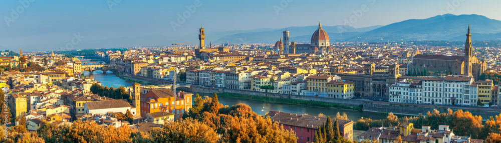Florence Italy, panorama city skyline at Arno river with with autumn foliage season