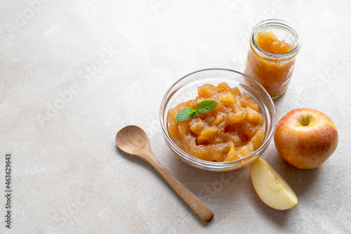 Homemade delicious fruit jam in glass bowl, copy space photo