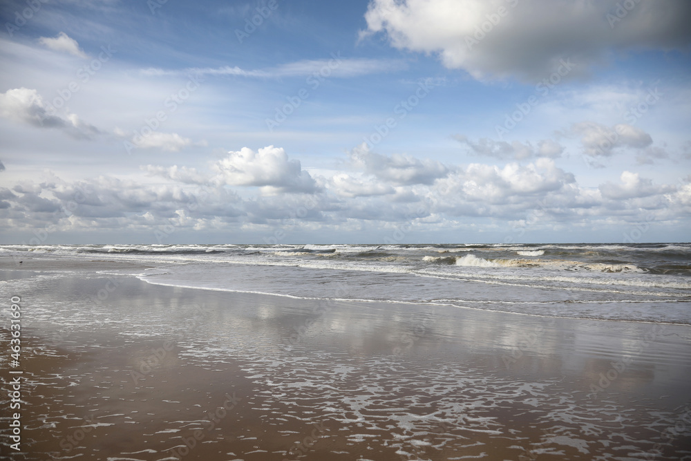 Stormy weather at the sea with clouds and waves