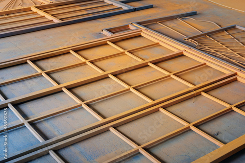 Abstract architectural metal industrial construction painted in orange color