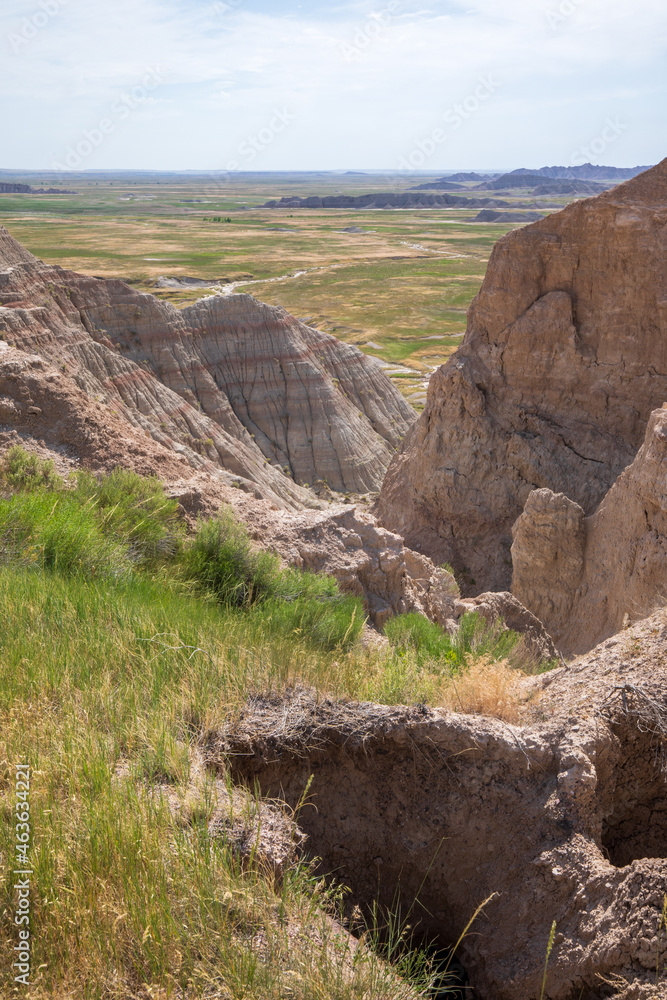 Norbeck Pass at Fossil Exhibit Trailhead in Badland national park during sunny summer. Badland landscape South Dakota. Norbeck Pass at Fossil Exhibit Trailhead in Badland national park during sunny summer. Badland landscape South Dakota.