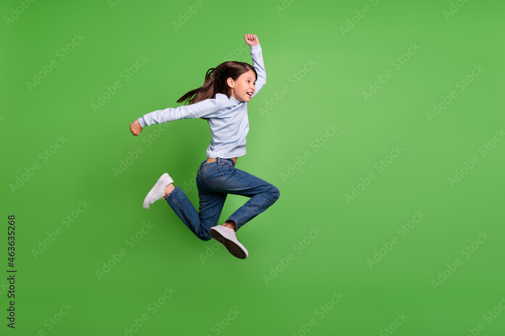 Φωτογραφία Photo of funky pretty schoolgirl wear blue turtleneck jumping high running fast